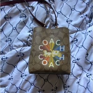Crossbody rainbow coach bag